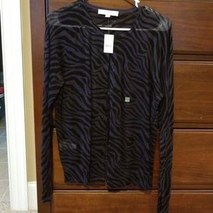 Zebra patterned sweater, size large